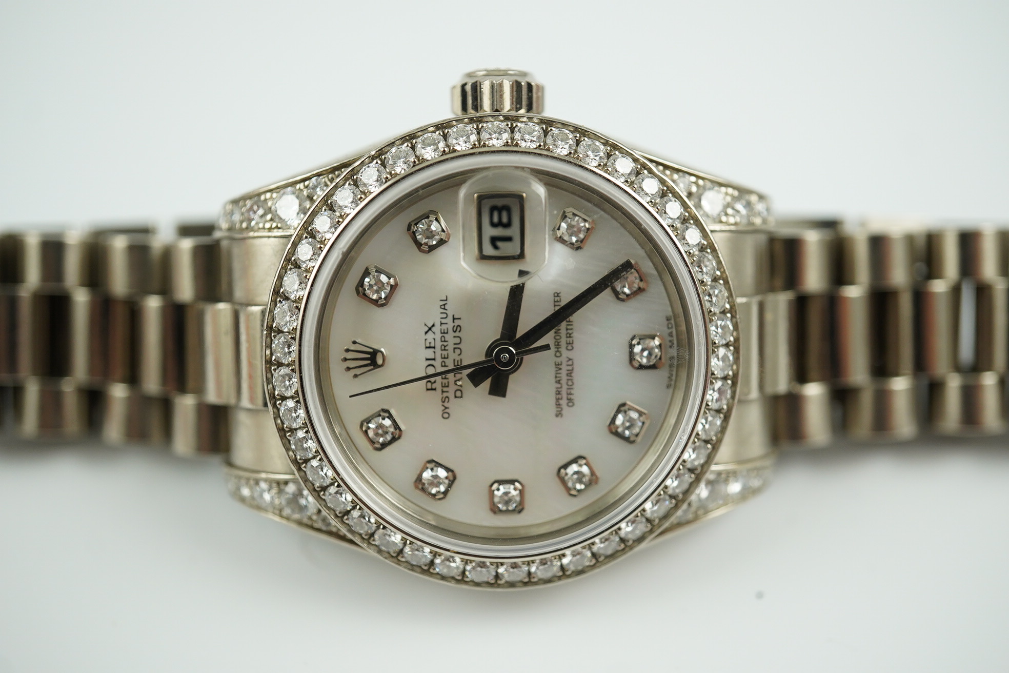 A lady's 2006 18ct white gold and diamond Rolex Oyster Perpetual Datejust wrist watch, on an 18ct white gold Rolex bracelet with deployment clasp